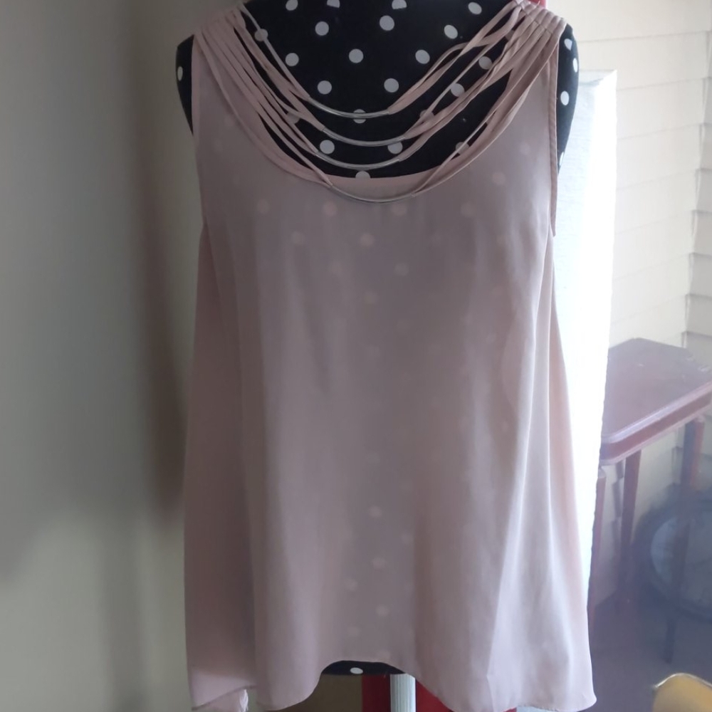 Light pink sleeveless blouse